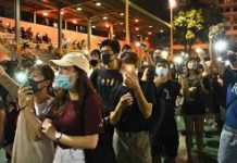 PEACEFUL HONG KONG MARCH MARRED BY FIRE OUTSIDE COURT, POLICE SAY